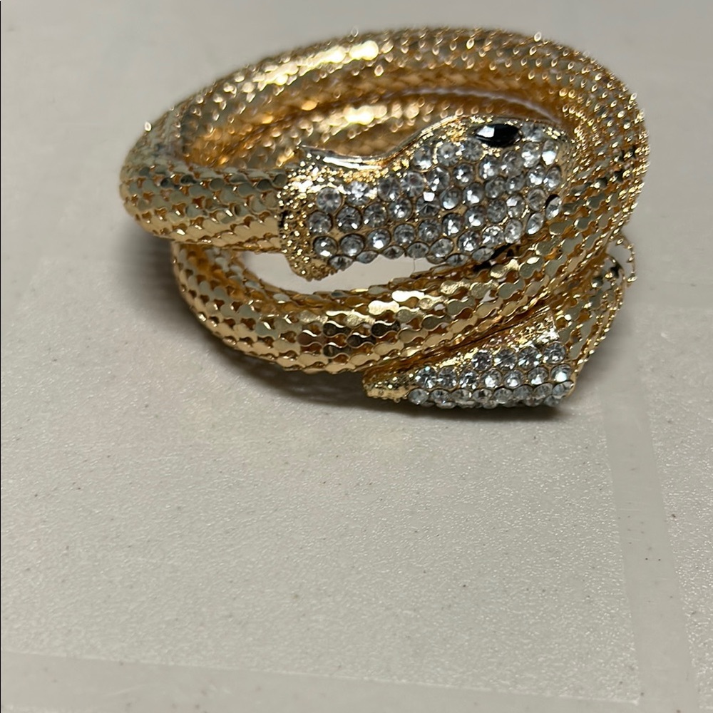 Gold tone and Silvery Serpent Bracelet with Sparkling Embellishments - Picture 3 of 12